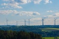 Wind generator silhouettes on the green hills.Windmill background.Green energy. renewable energy. Royalty Free Stock Photo