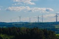 Wind generator silhouettes on the hills.Windmill set background.Green energy. renewable energy.Environmentally friendly Royalty Free Stock Photo