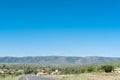 Wind generators line the mountains above Cookhouse