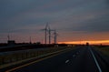 Wind generators at sunset a Texas ranch Royalty Free Stock Photo