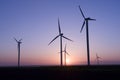 Wind generators at sunset