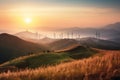 Wind generators turbines at sunset.