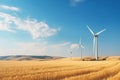 A wind generatots in the middle of wheat field in the sunset light