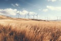 A wind generatots in the middle of wheat field in the sunset light