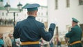 A wind instrument military parade - kapellmeister leading the orchestra