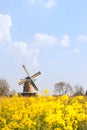 Wind mill in Dutch village Royalty Free Stock Photo