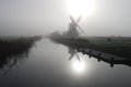 Wind Mill in the Fog Royalty Free Stock Photo