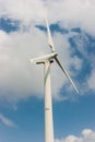 Wind mill power plan tagainst blue sky Royalty Free Stock Photo