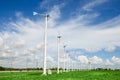 Wind mill power plant against blue sky Royalty Free Stock Photo