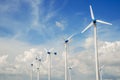 Wind mill power plant against blue sky Royalty Free Stock Photo