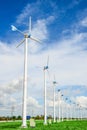 Wind mill power plant against blue sky Royalty Free Stock Photo