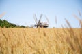 Wind mill. Windmill in a rural area. Wind Farm. Dutch windmill. Landscape with traditional Ukrainian windmills houses in Royalty Free Stock Photo