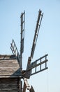 Wind mill. Windmill in a rural area. Wind Farm. Dutch windmill. Landscape with traditional Ukrainian windmills houses in Royalty Free Stock Photo