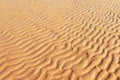 Wind patterns on the beach. Natural background of sand in ripple wave pattern. Royalty Free Stock Photo