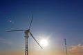 Wind power on the backdrop of the setting sun Royalty Free Stock Photo