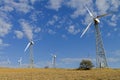 Wind power generators against the blue sky. Royalty Free Stock Photo