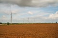 Wind power installations in agriculture the country. Royalty Free Stock Photo