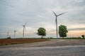 Wind power installations in agriculture the country. Royalty Free Stock Photo