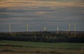 Wind power plants in field with sunset near Ottenschlag town in Austria evening