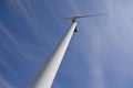 Wind power station against blue sky