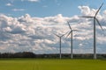 Wind power station - wind turbine against the cloudy sky. Spring Central Sweden Royalty Free Stock Photo