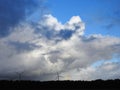 Wind power turbines and rainbow Royalty Free Stock Photo