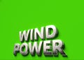 Wind power words as 3D sign or logo concept placed on green surface with copy space above it. New wind powered technologies