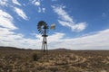 Wind pump in arid Karoo veld Royalty Free Stock Photo