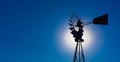 Wind pump windmill silhouette in the Karoo desert