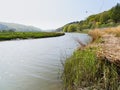 Wind rippled water of the River Dwyryd on a hazy spring day Royalty Free Stock Photo