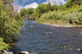 Walking Bridge Across the Wind River in Dubois Town Park in Western Wyoming. Royalty Free Stock Photo