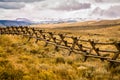 Wind River Mountains With Log Fence In Foreground Near Pinedale, Wyoming Royalty Free Stock Photo