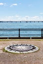 Wind rose compass on saint Helen`s island, saint Lawrence river and Jacoues cartier bridge in Montreal, Quebec, Canada