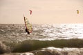 Wind surf and Kite surf at cloudy day in Portugal Royalty Free Stock Photo