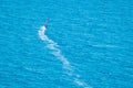 Wind surfer on blue sea Royalty Free Stock Photo