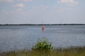 A wind surfer on the storage sea geeste germany with blue sky and white clouds Royalty Free Stock Photo