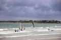 Wind surfers braving the wild storm