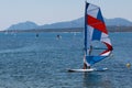 Wind Surfing in the Summer on Calm Coastal Water Royalty Free Stock Photo