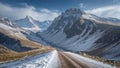 Wind-swept mountain pass with snow barely clinging to sharp ridgelines in early spring Royalty Free Stock Photo