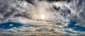 Panorama of sun breaking through clouds malestrom Royalty Free Stock Photo