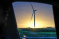 Wind tower turbine power plant at sunset Royalty Free Stock Photo