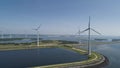 Wind turbine from aerial view, Drone view at windpark krammersluizen a windmill farm in the lake grevelingen in the Netherlands,