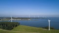 Wind turbine from aerial view, Drone view at windpark krammersluizen a windmill farm in the lake grevelingen in the Netherlands