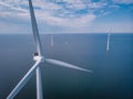 Wind turbine from aerial view, Drone view at windpark westermeerdijk a windmill farm in the lake IJsselmeer the biggest