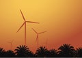 Wind turbine against the sunset background Royalty Free Stock Photo