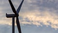 Wind turbine with blades generates environmentally friendly power.