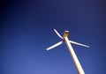 Wind turbine on blue. Royalty Free Stock Photo