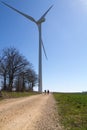 Wind turbine on blue sky Royalty Free Stock Photo