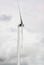 wind turbine close-up against a cloudy sky background Royalty Free Stock Photo