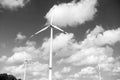 Wind turbine on cloudy blue sky. Alternative energy and electricity source. Global warming. climate change and ecology Royalty Free Stock Photo